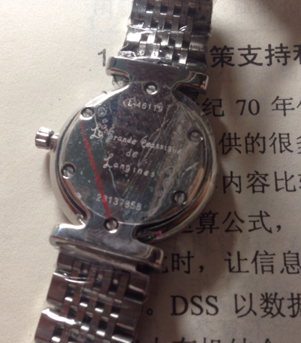 求辨别浪琴手表真假! 朋友在京东买的一块手表