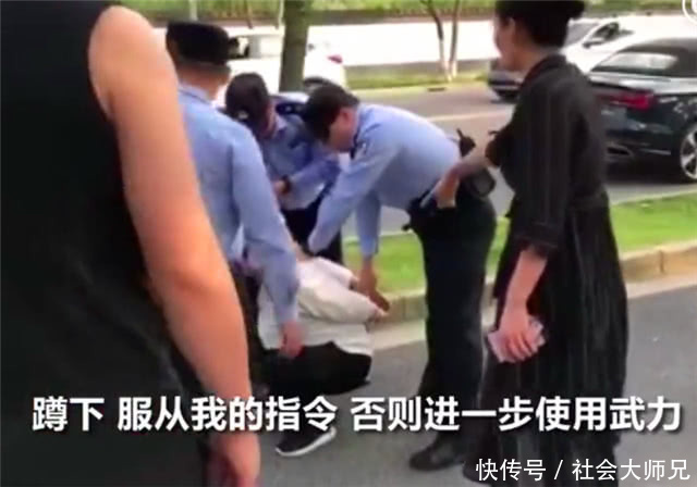 上海男子无照无证驾驶带着妻子一起挑衅抗法 被警察强制执法后老