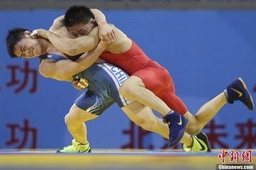 就教出了十几位世界冠军,其中包括为中国赢得了首枚奥运摔跤金牌的