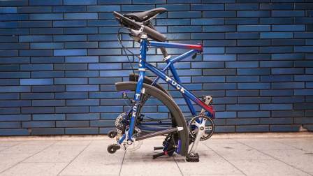 这全尺寸折叠自行车，车轮可拆分成3段，折叠后仅行李箱大小