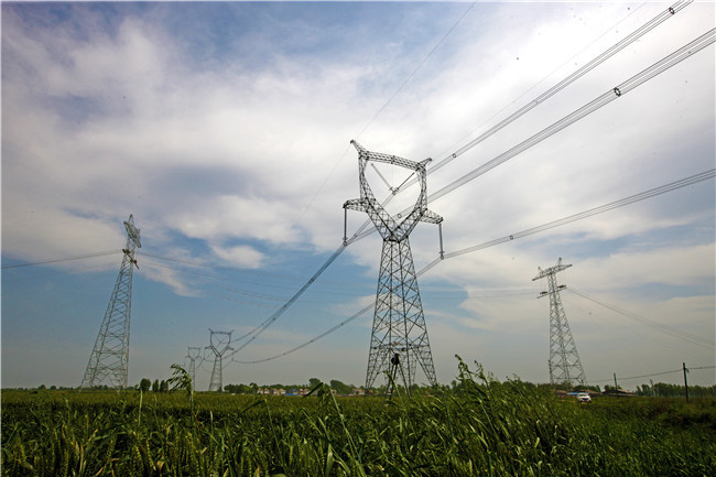 世界首条电压等级最高直流线路跨越电压等级最高交流线路开始架线施工
